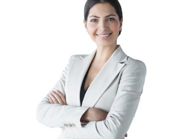 wisnet-smiling-female-business-leader-with-arms-crossed